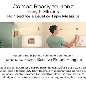K&ouml;nnte beinhalten: Eine Person demonstriert, wie man ein Bild mit einem Beehive Picture Hanger aufh&auml;ngt. Das Bild zeigt eine Nahaufnahme des an einer Wand befestigten H&auml;ngers. Der Text auf dem Bild lautet "Comes Ready to Hang, Hang in Minutes, No Need for a Level or Tape Measure".