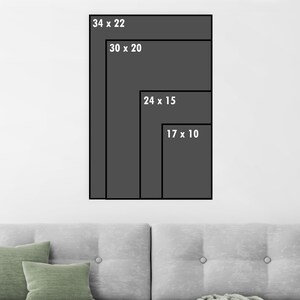 May include: Four black frames of different sizes with white text indicating their dimensions in inches. The largest frame is 34 x 22 inches, the next is 30 x 20 inches, the next is 24 x 15 inches, and the smallest is 17 x 10 inches.