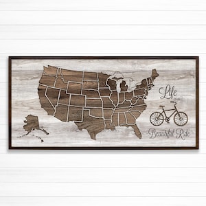 Carte des États-Unis à vélo, carte encadrée sur toile tendue, carte pour cyclistes, défi vélo des 50 États, épingles conviviales pour marquer les courses et les voyages à vélo !