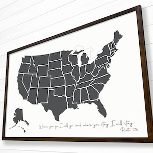 May include: A black and white print of a map of the United States with the states outlined. The map includes Alaska and Hawaii. The text "Where you go I will go, and where you stay I will stay Ruth 1:16" is printed below the map.