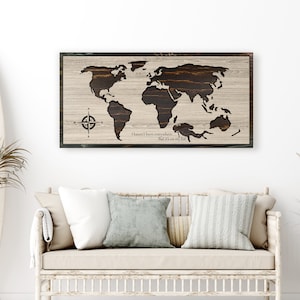 May include: A wooden world map wall art with a compass and the text "I haven't been everywhere, but it's on my list".