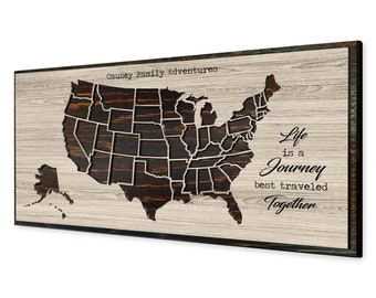 Framed map of the United States | Carved into wood and can be personalized with your own text | Use push pins to mark your travels