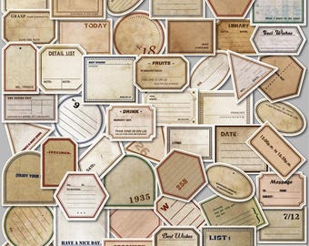 May include: A selection of vintage-style paper labels and stickers in various shapes and sizes. The labels feature aged paper textures, with text such as "Journey," "Notes," "Best Wishes," and "Date." The color palette includes beige, brown, and red accents.