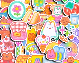 May include: A selection of vibrant, hand-drawn stickers showcasing food and adorable characters. The stickers depict cake slices, ice cream cones, a jam jar, and a smiling rabbit. The colour scheme is bright and playful, with an emphasis on pastel hues.