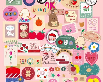 May include: A selection of colourful stickers with diverse designs, such as cartoon animals, fruits, flowers, and text. The stickers display phrases like "Lucky!", "Sweet Dream", and "Happy Hour". The overall theme is cute and whimsical.