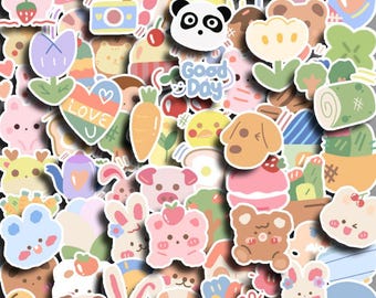 May include: A selection of colourful, cartoon-style stickers with diverse designs. Includes a panda, dog, bunny, and other cute characters. Some stickers have text like "Good Day" and "Love U".