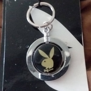 Llavero AUTÉNTICO de Playboy (cabeza de conejo de dos lados) CON LICENCIA DE 3E Trading, LLC (hay varios otros estilos disponibles)