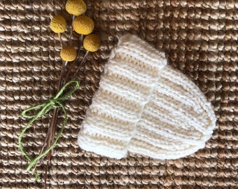 Winter white hand knitted baby beanie. Handmade in Australia.