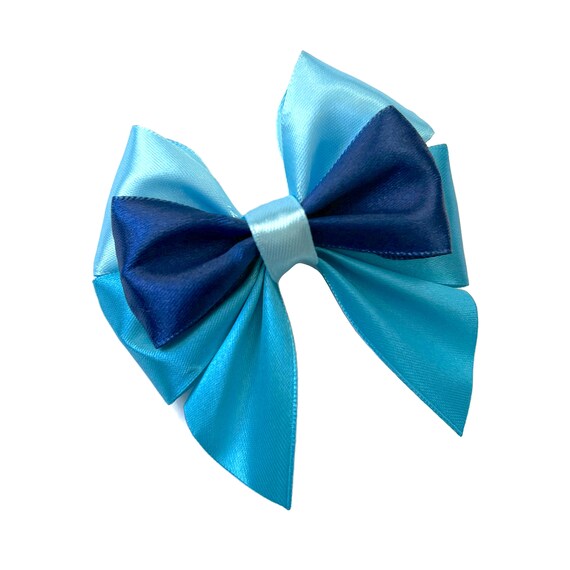 Blue satin bows. Silk ribbon bows  Background Graphics ~ Creative Market