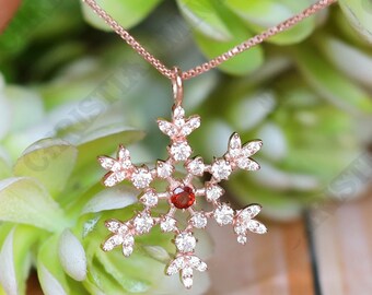 Winter Snowflake Pendant Necklace: Sterling Silver, Garnet Accent