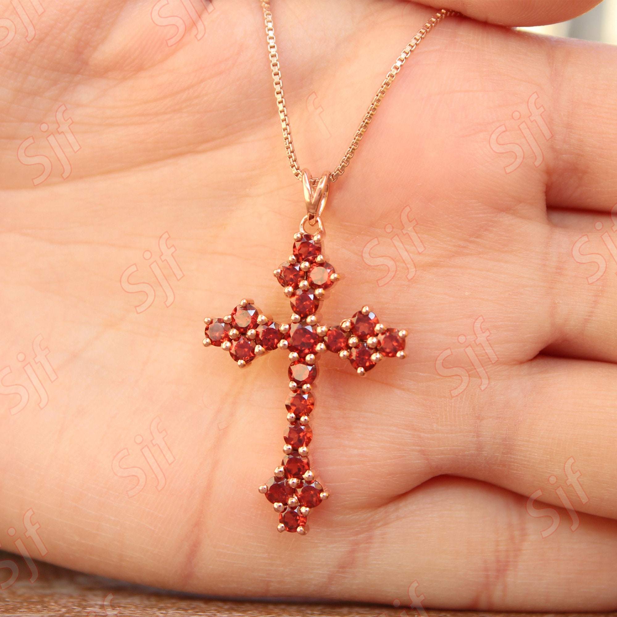 Garnet cross pendant deals