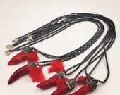 Red not chilly Pepper necklace, Long faced ematite beads with red bamboo coral Pepper , tassel and 925 sterline silver components.