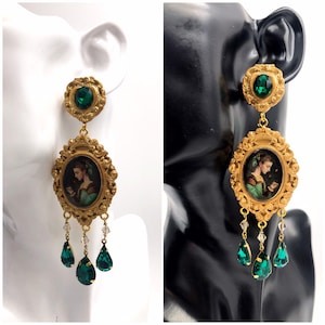 Picture earrings to wear, frame earrings with young woman painted, the woman in green. MADE TO ORDER