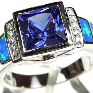 3 karaat tanzaniet en blauwe vuuropaal inleg 925 sterlingzilver heren damesring