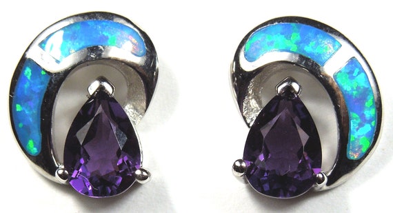 Sterling Silver 5x7mm Oval Created White Opal Post Earrings Sterling Silver 5x7mm Oval Created White Opal Post Earrings