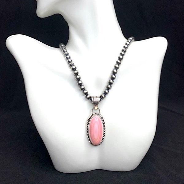 Pink Conch & Sterling Silver Pendant. Navajo made. Signed, Chain is not included.