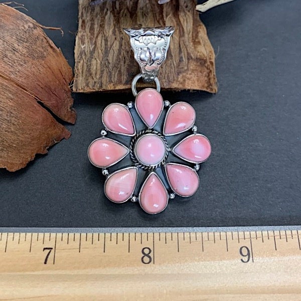 Pink Conch & Sterling Silver Cluster pendant. Chain is not inclued.