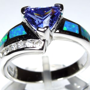Details about Tanzanite & Blue Fire Opal Inlay Solid 925 Sterling Silver Ring Size 6,7,8,9 Details about Tanzanite & Blue Fire Opal Inlay Solid 925 Sterling Silver Ring Size 6,7,8,9