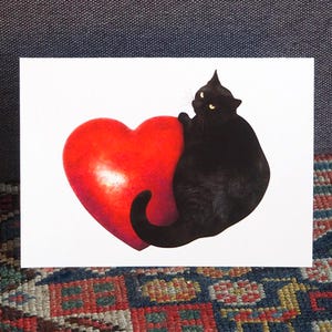 Carte de Saint-Valentin coeur rouge chat noir