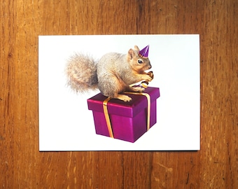 Squirrel on Purple Gift Box Birthday Card