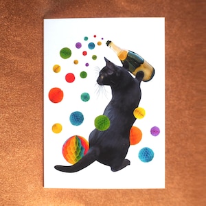 Carte de chat noir avec des boules pétillantes et colorées, carte d'anniversaire de chat