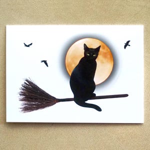 Carte Halloween chat noir sur balai