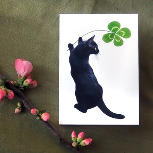 Carte Chat noir porte-bonheur avec trèfle à quatre feuilles