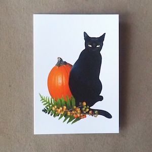 Carte d'automne de fougères de citrouille de chat noir