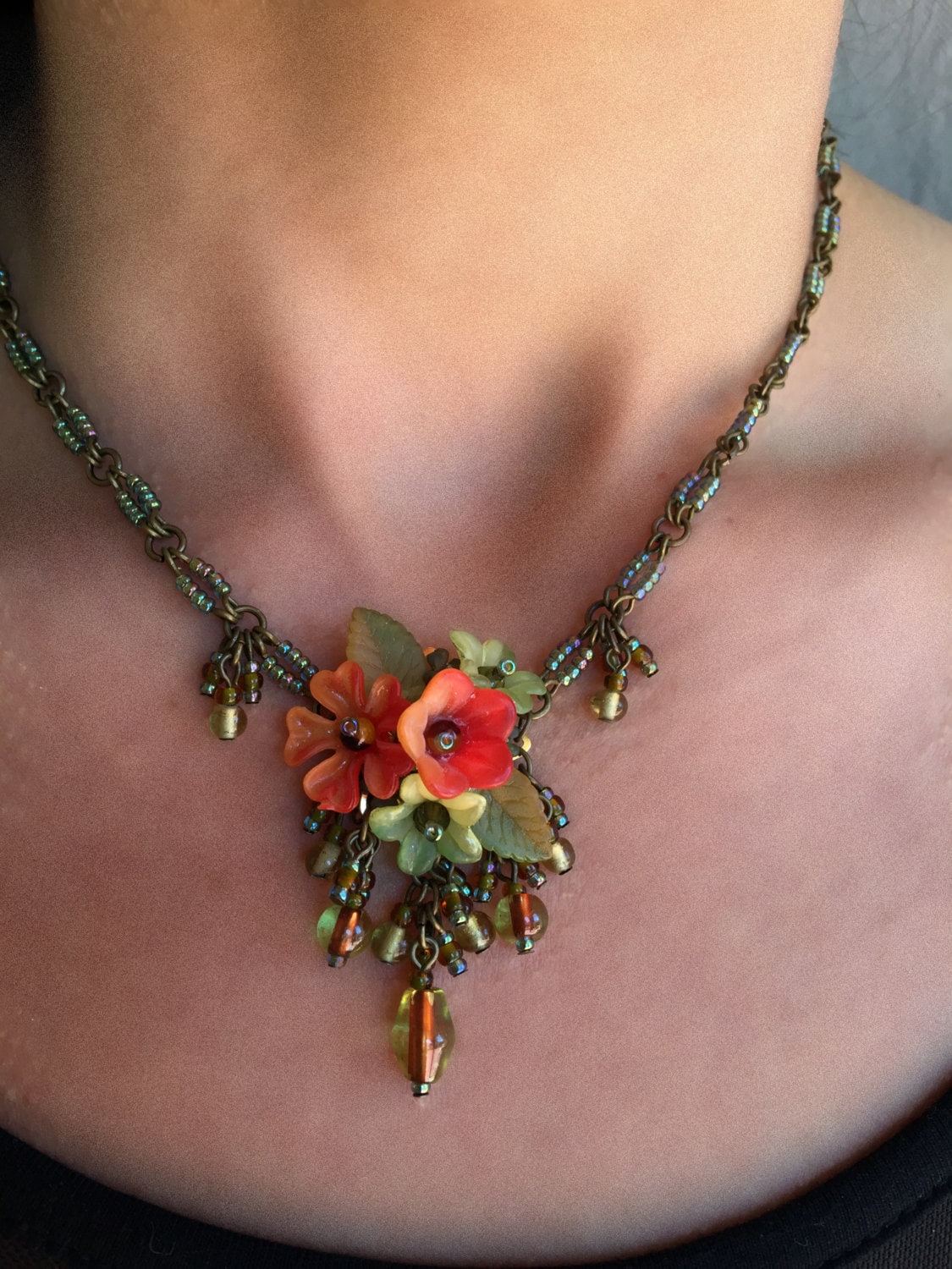 コリーン・トーランド作、オレンジサンセットのハンドビーズ