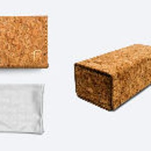 May include: A set of four cork-covered cases for sunglasses. The cases are in different shapes and sizes, and one case is open to reveal a brown interior. The cases are all made of natural cork and have a rustic, earthy look.