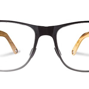 May include: Black rectangular eyeglasses with a brown wood-like frame. The frame has a subtle sheen.