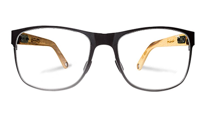 May include: Black rectangular eyeglasses with a brown wood-like frame. The frame has a subtle sheen.