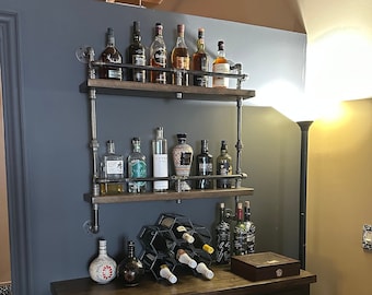 industrial bar made with pipes and wood industrial solid unit for liquor bottles collection real pipe and wood