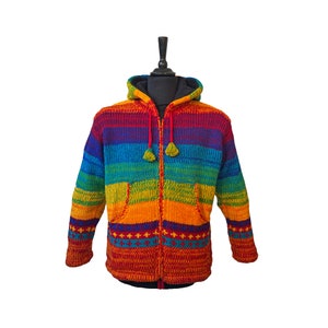 May include: A rainbow striped knitted hooded jacket with a zip closure and two front pockets.