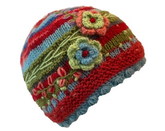 Pretty Flowers Hand Knitted Beanie Hat in Reds, Blues and Greens with Crochet Detail. Features Scalloped Edging and Soft Fleece Lining.