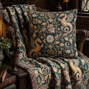May include: A square throw pillow and a matching woven throw blanket featuring a dark green background with an intricate pattern of golden dragons, floral motifs, and celestial elements. Both items have a textured, tapestry-style fabric finish.