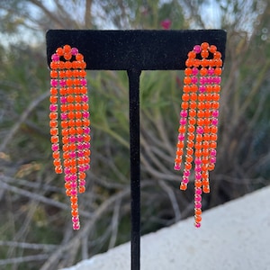 Neon orange and pink rhinestone fringe earrings