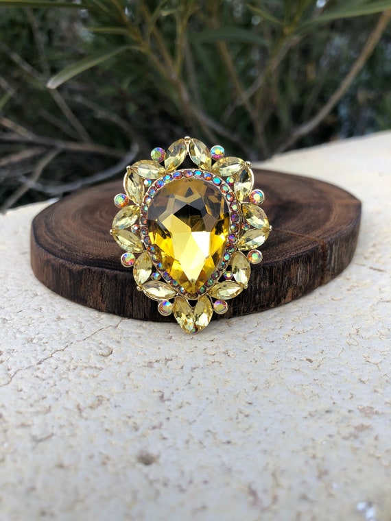 Yellow crystal ring deals