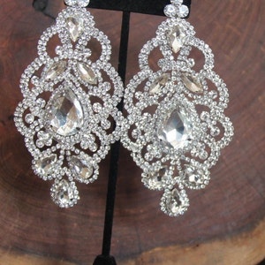 oversized crystal chandelier earrings, huge rhinestone earrings, statement clear crystal earrings, large rhinestone pageant earrings Silver Base Metal