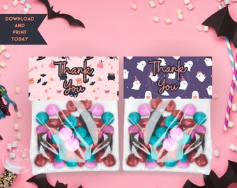 May include: Two printable Halloween treat bag designs. One features a pink background with witches, bats, and cauldrons. The other features a purple background with ghosts. Both designs say "Thank You".