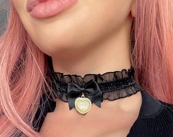 Black lace choker with bow and gold heart