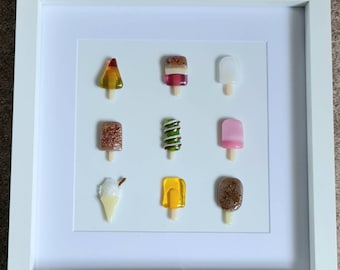 Fused glass ice lollies picture in a frame