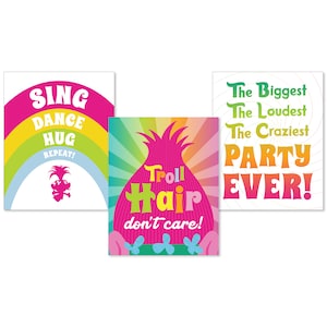 May include: Three colourful cards with a rainbow background and a cartoon troll with pink hair. The first card says "Sing Dance Hug Repeat!" The second card says "Troll Hair don't care!" The third card says "The Biggest The Loudest The Craziest Party Ever!"