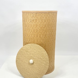 May include: A set of three ceramic mugs with a speckled, matte finish. Each mug features a different color: light blue, cream, and gray. The mugs have a simple, modern design and a comfortable handle. Perfect for coffee or tea.