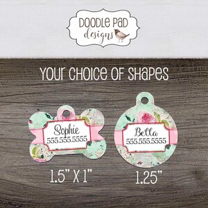 May include: Two pet ID tags with floral patterns and the names "Sophie" and "Bella". The bone-shaped tag is 1.5" x 1", and the round tag is 1.25". Each tag includes a phone number and the text "Your Choice of Shapes".