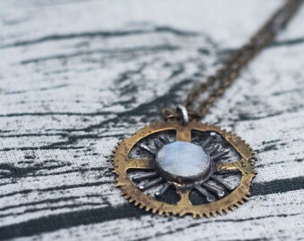 pendant- moonstone, watch, brass.
