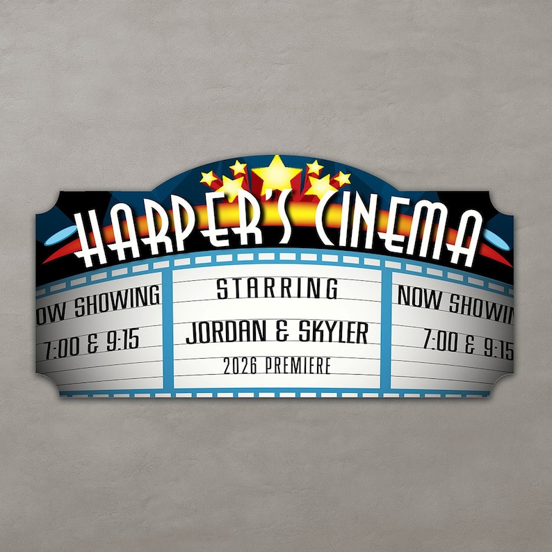 Close-up of home theater sign with vivid colors and a natural wood grain finish.