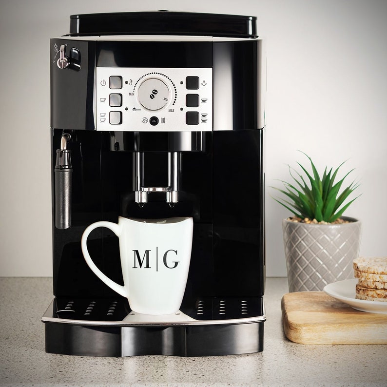 Custom coffee mug on a coffee machine.