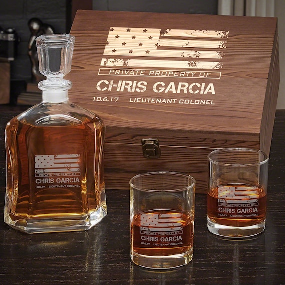 Engraved military whiskey decanter set in a gift box — personalized with name/rank/branch for a genuinely thoughtful, display-worthy tribute.