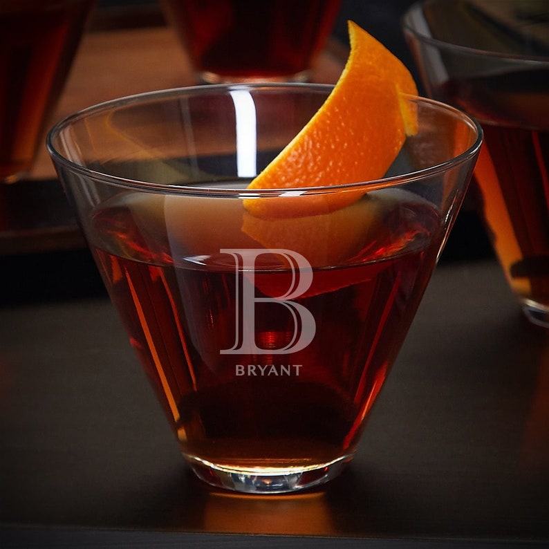 Close-up of the personalized stemless martini glass with initial and name.